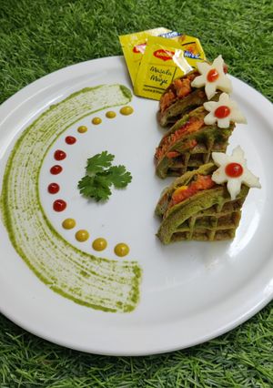 A picture of Cheesy Veggie Moong Waffle Bites.