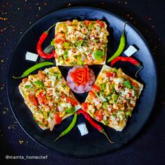 A picture of Paneer Chilli Cheese Toast.