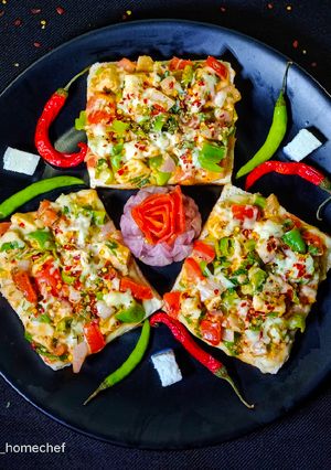 A picture of Paneer Chilli Cheese Toast.