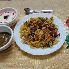 A picture of Satrangi layered veg Biryani.