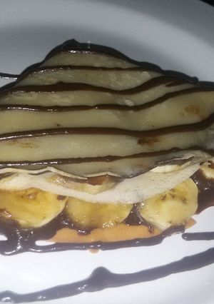 A picture of Crepes with banana.