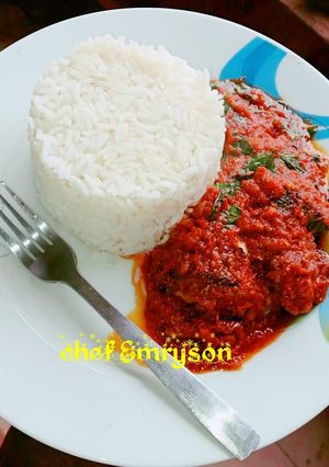 A picture of Rice and tomato stew.