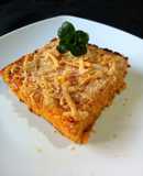 Pastel de calabaza y queso, con salsa bechamel