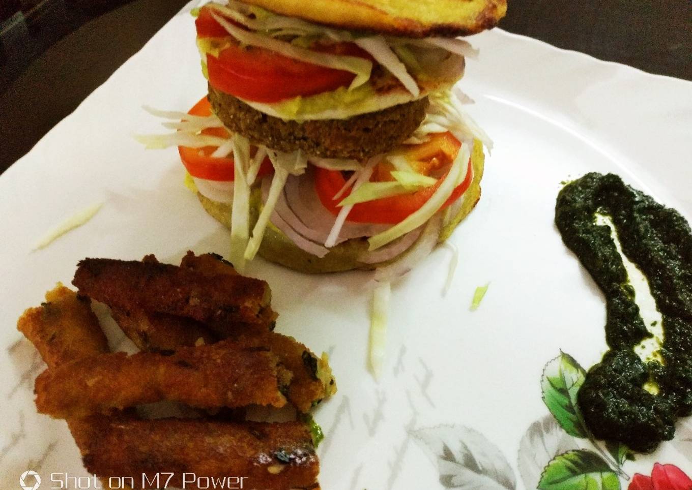 Semolina Avocado cakeÂ veg burger with dal tikkiÂ and stick