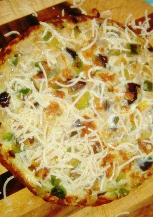Una foto de Tortilla de berenjena y zapallitos, con semillas y avena