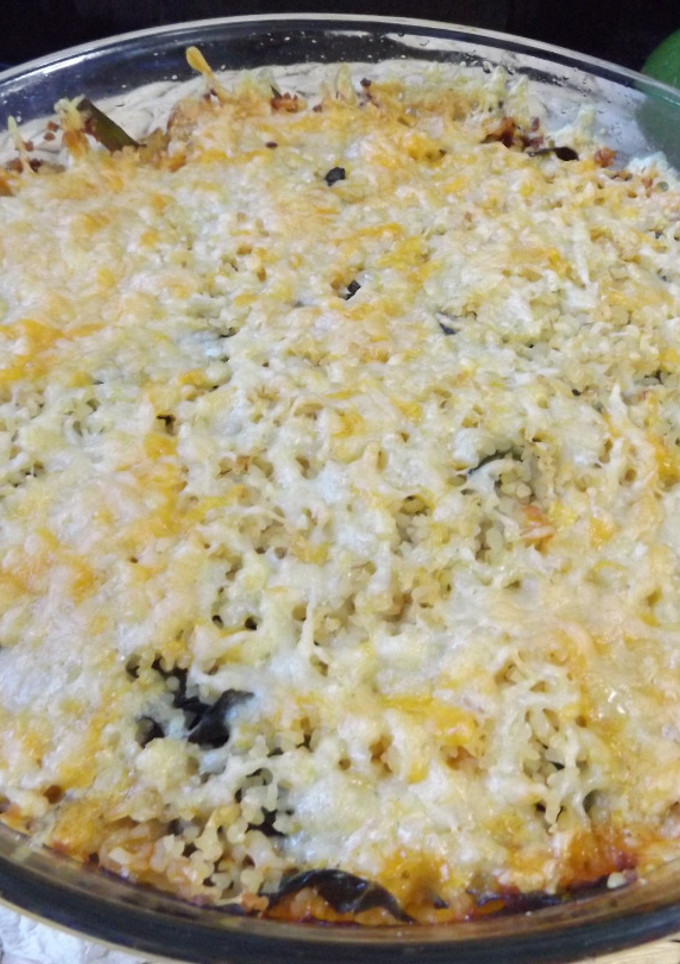 Una foto de Horneado de carnes variadas con bulgur y verduras