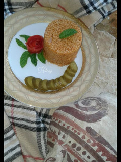 صورة لوصفة برغل بصلصة البندورة
