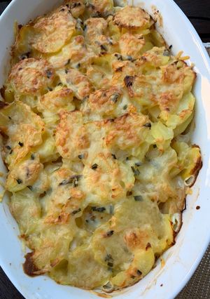 Une photo de Gratin de pommes de terre, saumon fumé et ciboulette