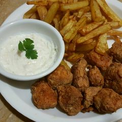 A picture of Chilli n spice chicken with french fries n mayo garlic sauce😋.