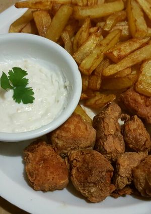 A picture of Chilli n spice chicken with french fries n mayo garlic sauce😋.