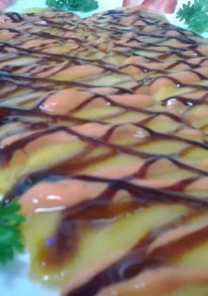 Una foto de Carpaccio de mango escarchado