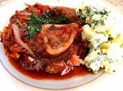 Una foto de ossobuco vino tinto