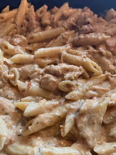 A picture of Garlic Parmesan Slow Cooker Chicken (Buffalo Wild Wings Sauce).