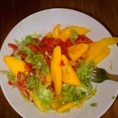 A picture of Mango, lettuce salad.