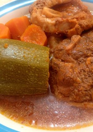 A picture of Pork Shank with Vegetables.