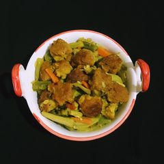 A picture of Lentil Fritters in mix veg curry.