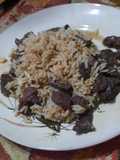 Carne al ajillo con vino tinto y arroz