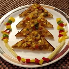 A picture of Bread Pizza Without Cheese.