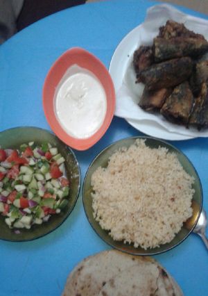 صورة لوصفة سمك مقلى مع ارز بالبصل