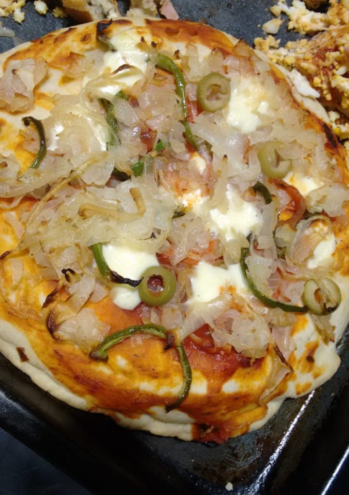 Una foto de Pizza  rellena casera