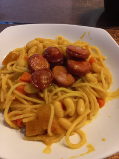 Una foto de Porotos con riendas y longanizas