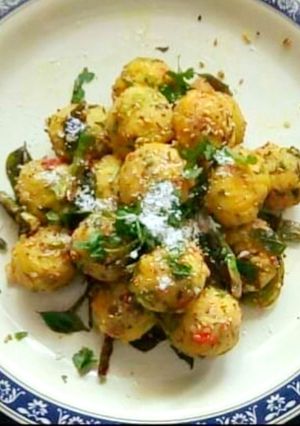 A picture of Veg Khandvi Balls.