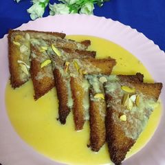 Sahi tukda (fried bread with mango rabdi) A picture of Sahi tukda (fried bread with mango rabdi).