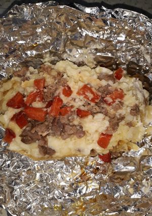 Una foto de Papa asada al carbón 🥔