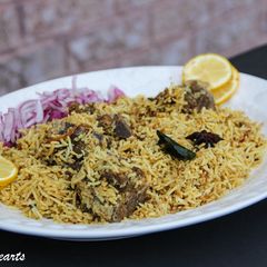 Kachche Gosht Ki Biryani / Hyderabadi Mutton Dum Biryani A picture of Kachche Gosht Ki Biryani / Hyderabadi Mutton Dum Biryani.