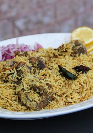 A picture of Kachche Gosht Ki Biryani / Hyderabadi Mutton Dum Biryani.