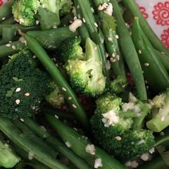 A picture of Greens and sesame seeds.