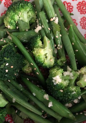 A picture of Greens and sesame seeds.