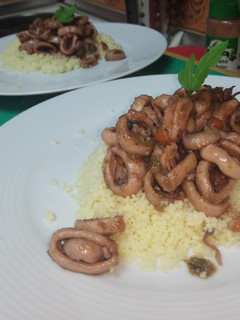 Una foto de Calamares al curry con Cous Cous