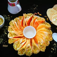 A picture of Katayef with cream cheese or shrikhand.