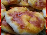 Una foto de pizza copetin