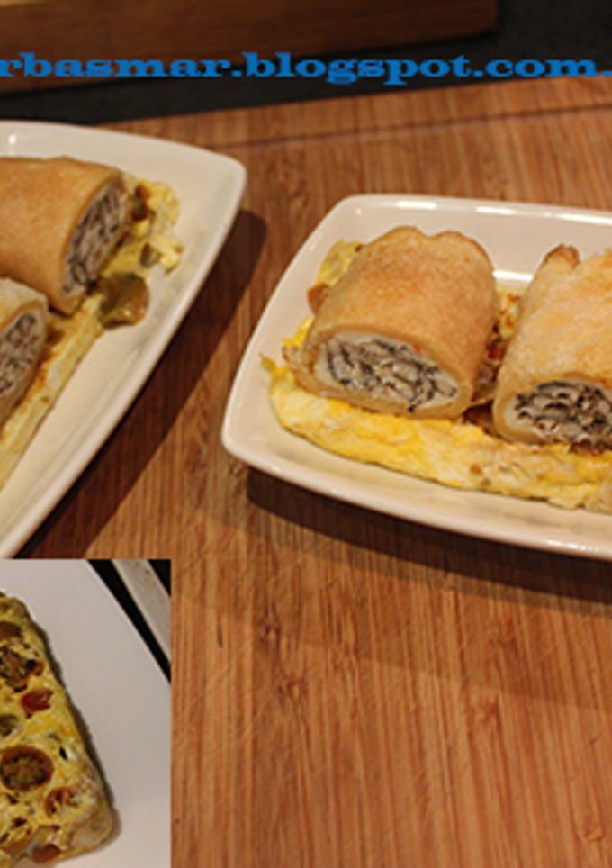 Una foto de Medios rollitos de boquerones con base de tortilla