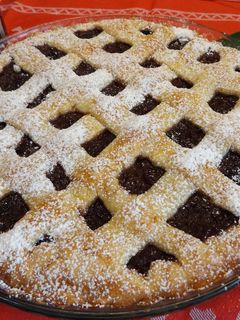 Una foto de Tarta rellena de confitura de calabaza, cereza y manzana