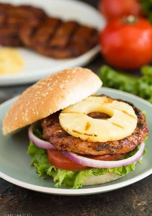 A picture of Home made pineapple burger.