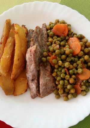 A picture of Deep fried sweet potatoes/arrow roots & fried peas.