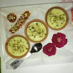 A picture of Leftover Carrot Halwa Roll With Custard.