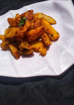 A picture of Garlicky buttered potatoes.