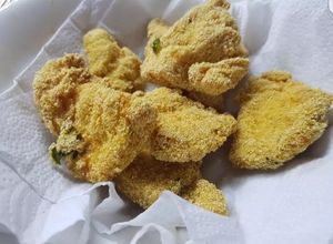 Una foto de Chicken fingers con Polenta