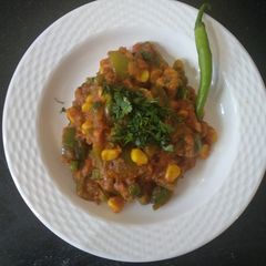 A picture of Capsicum sweet corn matar sabji.