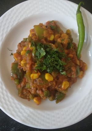 A picture of Capsicum sweet corn matar sabji.