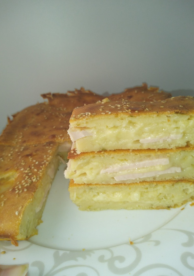 Una foto de Empanada pavo y queso
