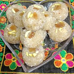 Coconut Rava Ladoo Prasad For Gauri Ganesh A picture of Coconut Rava Ladoo Prasad For Gauri Ganesh.