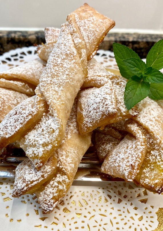 Una foto de Lazos de hojaldre rellenos con cabello de ángel
