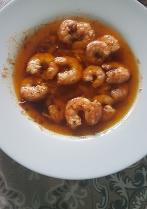 Una foto de Langostinos al pilpil