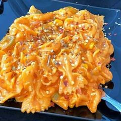 A picture of Red sauce pasta.