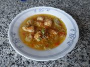 Una foto de alcauciles con chicharos
